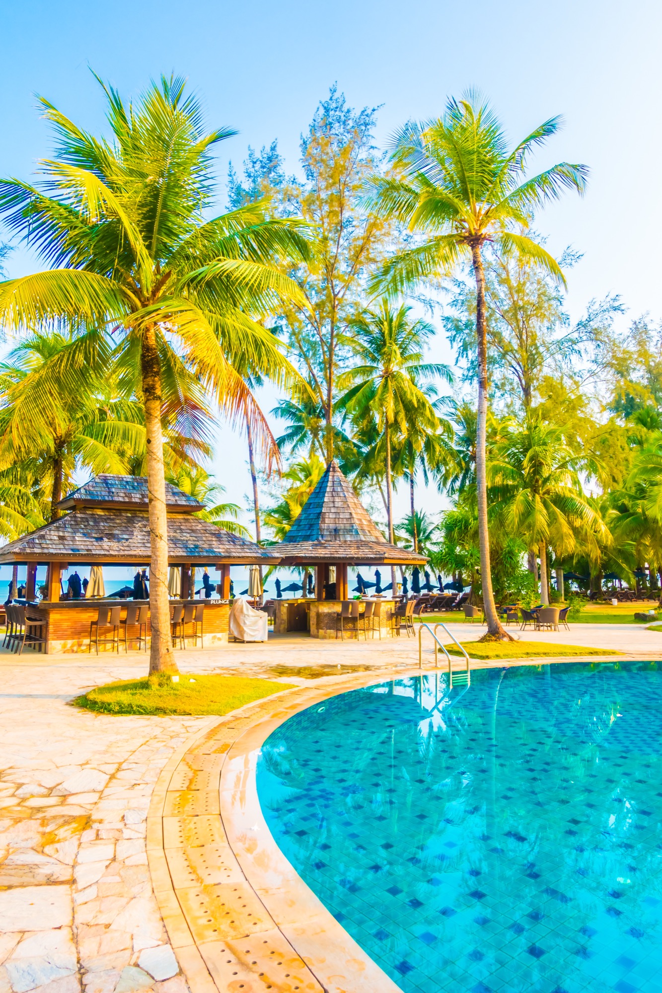Poolside lounge and bar area at a luxury resort